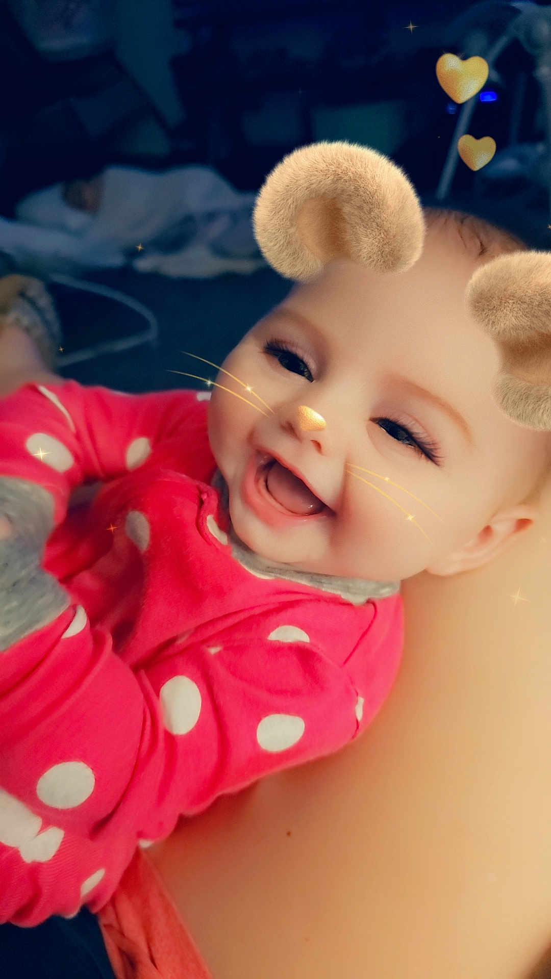 Chloe is registered to the contest to win money with this photo: baby, child, smiling, pink_clothing, polka_dots, face_filter, bear_ears, whiskers, nose, digital_effects, happy, cute, infant, closeup, portrait, indoor, human, baby_girl, joyful, playful