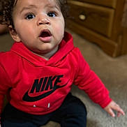 Jaxxon is registered to the contest to win money with this photo: baby, bodypart, clothing, crawling, face, finger, hand, hardwood, head, hoodie, knitwear, longsleeve, pants, person, photography, portrait, sleeve, sweater, sweatshirt, wood