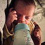 baby, bed, bottle, care, closeup, clothing, comfort, cuddle, feeding, hand, human, infant, milk, newborn, peaceful, person, rest, skin, sleeping, soft_light