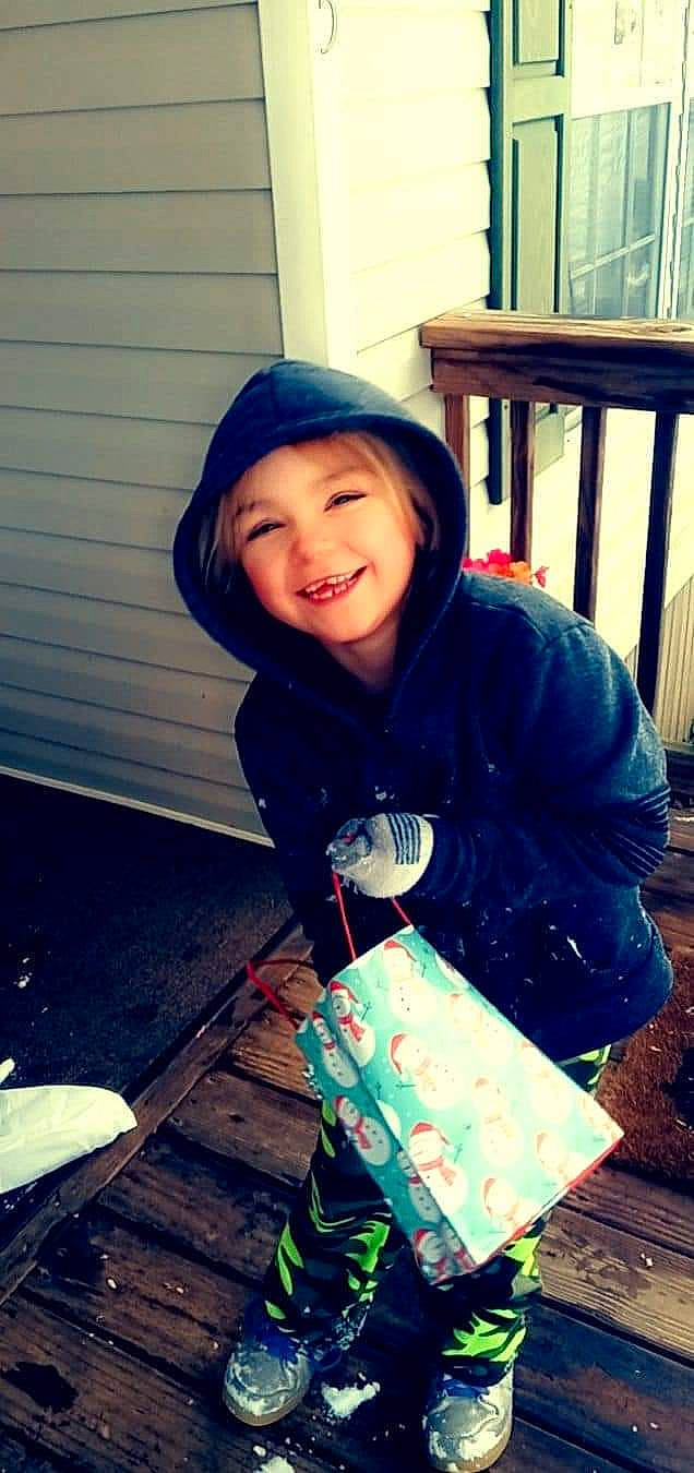 Braelynn is registered to the contest to win money with this photo: child, cool, denim, electric_blue, fashion_accessory, fun, happy, headwear, jacket, joy, leisure, magenta, outerwear, pattern, person, recreation, sitting, sleeve, smile, street_fashion