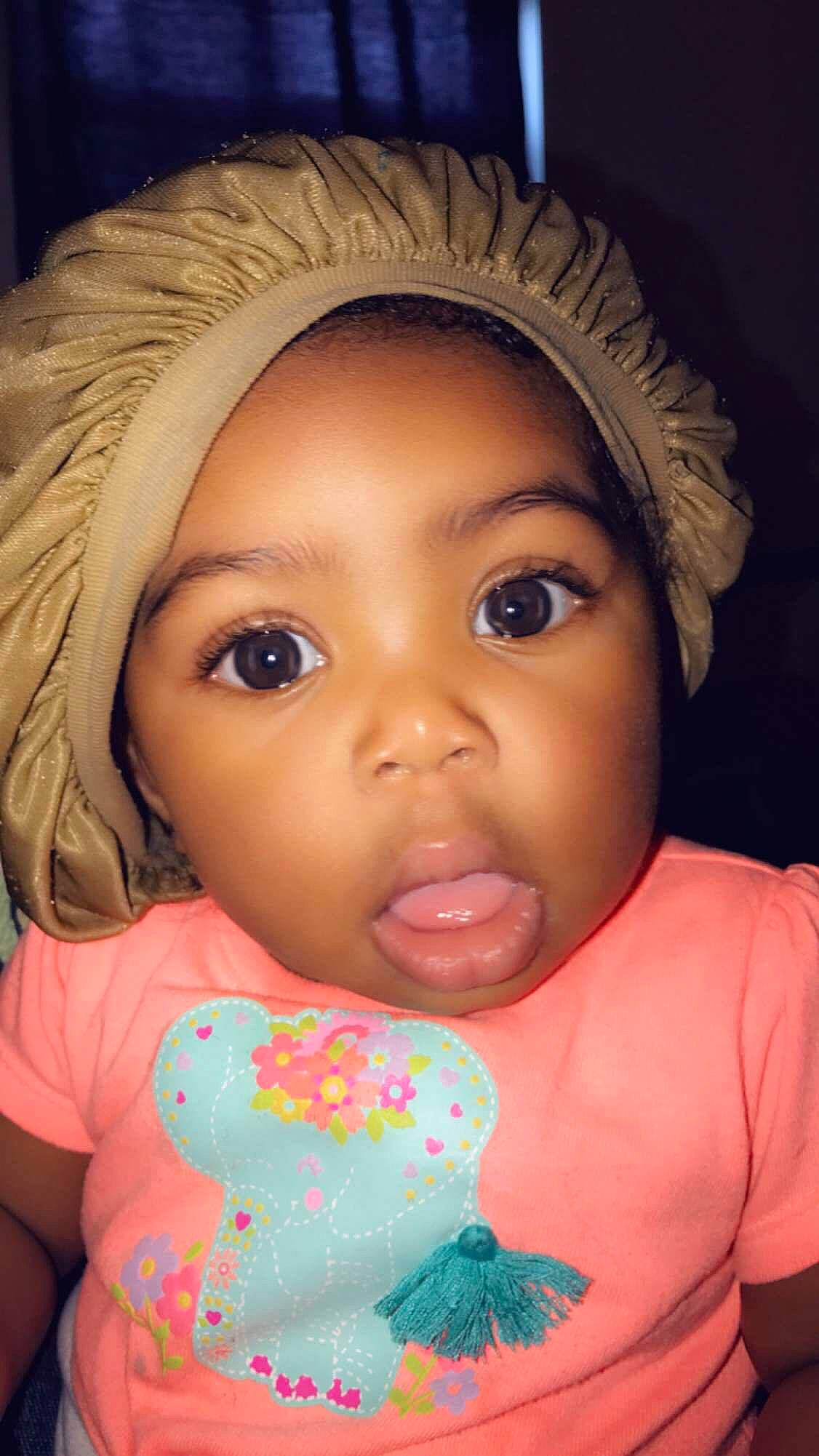 Dreambella joined the competition — help win amazing prizes! baby, cheek, child, chin, eye, eyebrow, eyelash, face, forehead, hair, head, headgear, iris, lip, mouth, neck, nose, person, pink, skin