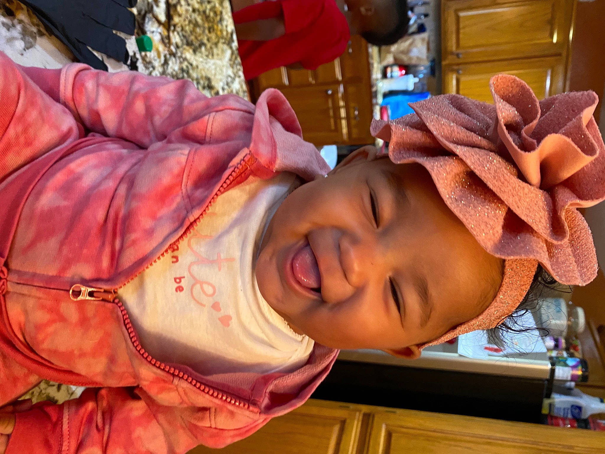 Mariyah joined the competition — help win amazing prizes! baby, child, costume, event, eyewear, fun, happy, hat, headwear, mouth, orange, peach, person, plant, room, smile, textile, toddler, tradition, tree