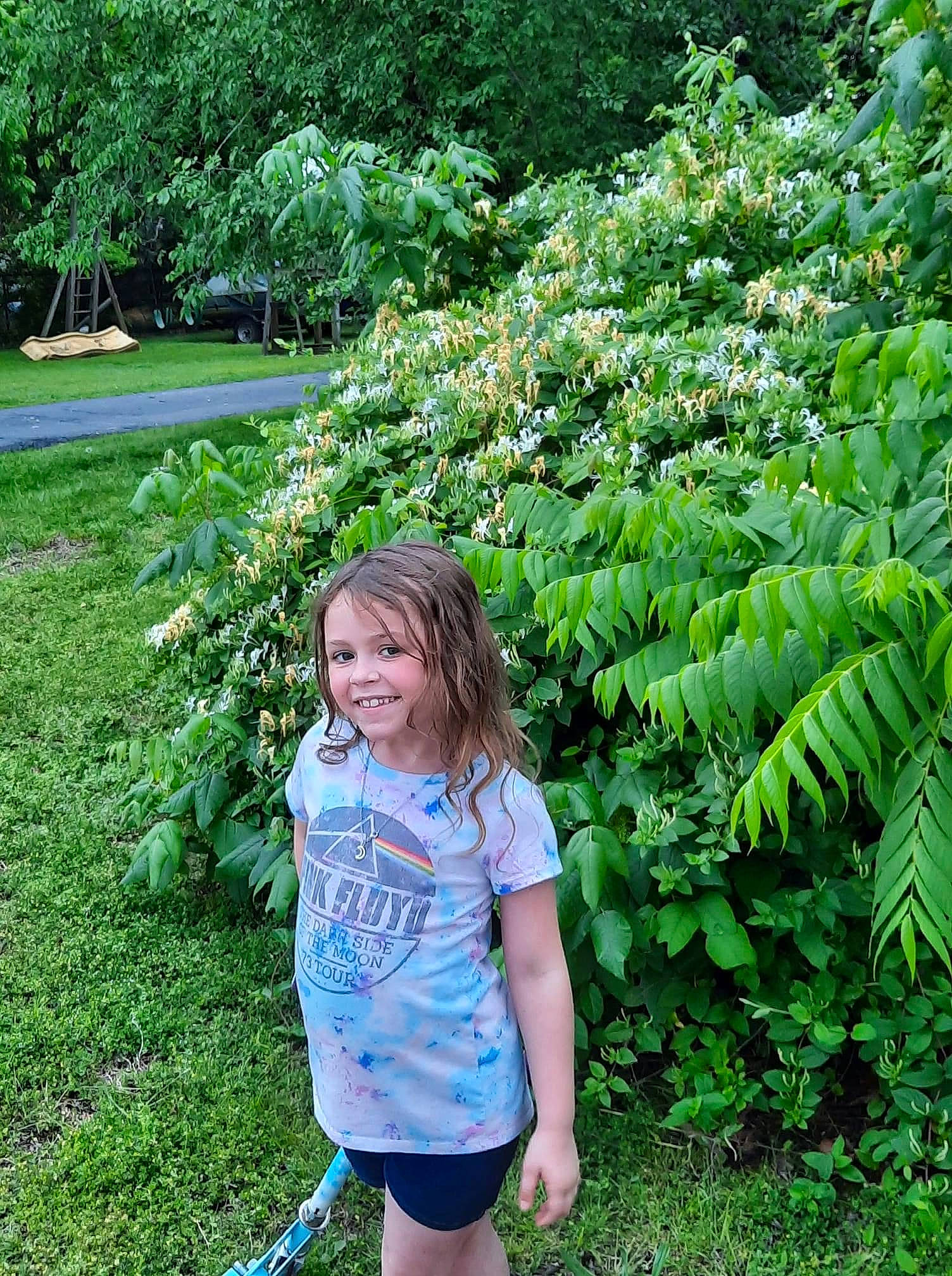 Elayna joined the competition — help win amazing prizes! annual_plant, electric_blue, flower, flowering_plant, garden, grass, grass_family, groundcover, happy, joy, landscaping, leisure, people_in_nature, person, plant, shorts, shrub, smile, t_shirt, terrestrial_plant