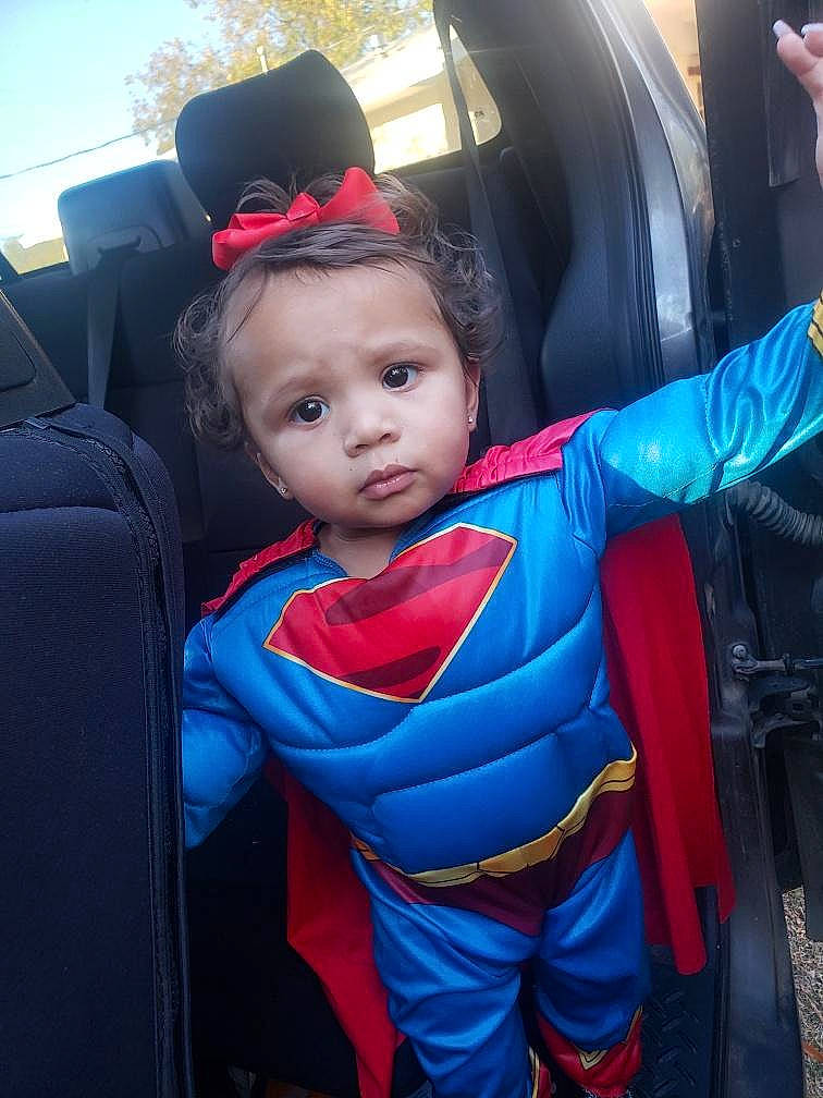 Londynn is registered to the contest to win money with this photo: auto_part, automotive_design, automotive_exterior, baby, car_seat, car_seat_cover, child, electric_blue, family_car, fun, head_restraint, leisure, luxury_vehicle, motor_vehicle, person, personal_protective_equipment, steering_wheel, toddler, travel, vacation