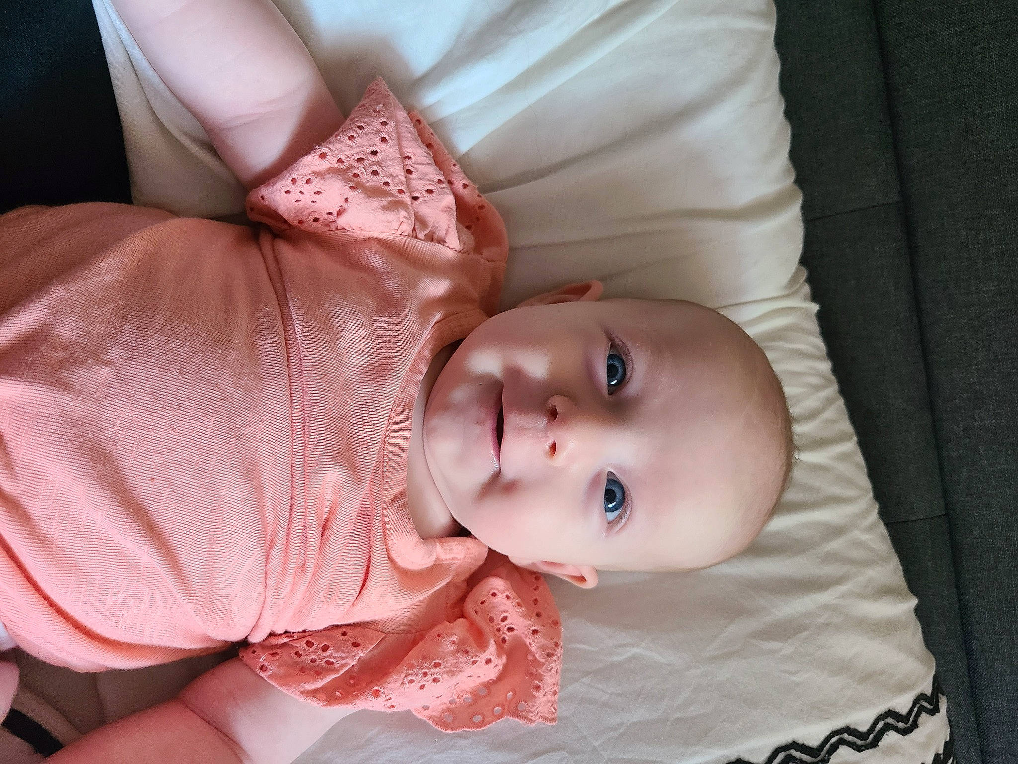 Scarlett Grace is registered to the contest to win money with this photo: baby, baby_products, baby_toddler_clothing, cheek, child, comfort, dress, eyebrow, eyelash, finger, iris, linens, lip, mouth, nose, person, pink, skin, sleeve, smile