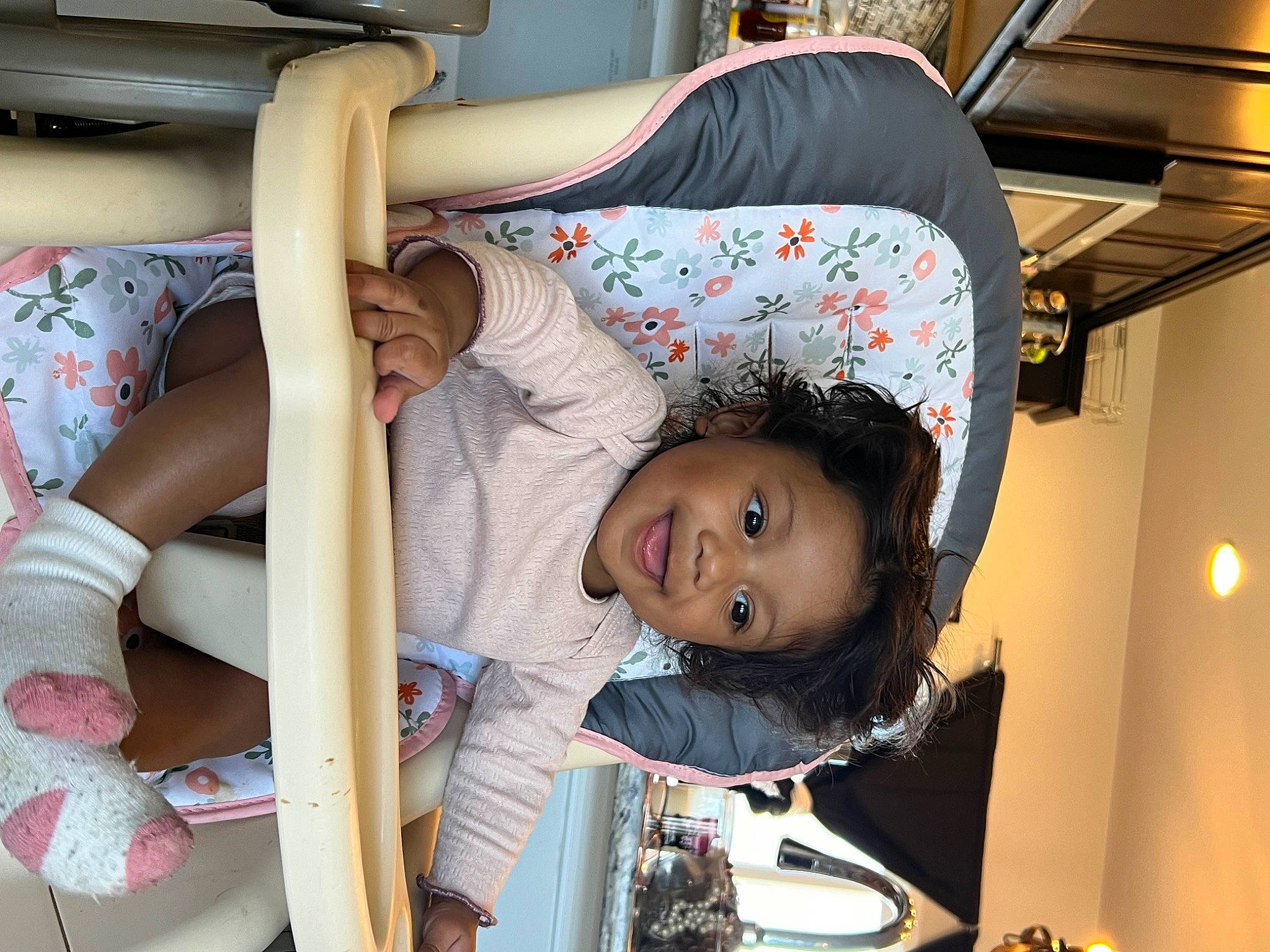 Lina is registered to the contest to win money with this photo: baby, baby_products, black_hair, car_seat, child, comfort, fun, happy, joy, person, room, smile, thigh, toddler