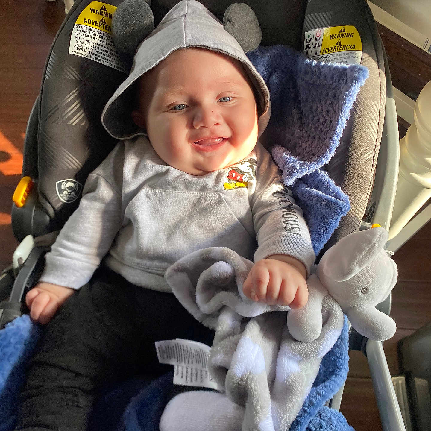 Emiliano is registered to the contest to win money with this photo: baby, bonnet, cap, clothing, coat, cushion, face, furniture, happy, hat, head, homedecor, jacket, knitwear, pants, person, photography, portrait, smile, sweater