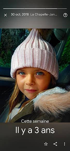 Inès participe au concours pour gagner de l'argent avec cette photo : brown_hair, cap, electric_blue, eyelash, fashion_accessory, flash_photography, fur, hair_accessory, hairstyle, happy, head, headgear, headwear, joy, knit_cap, long_hair, magenta, person, poster, street_fashion