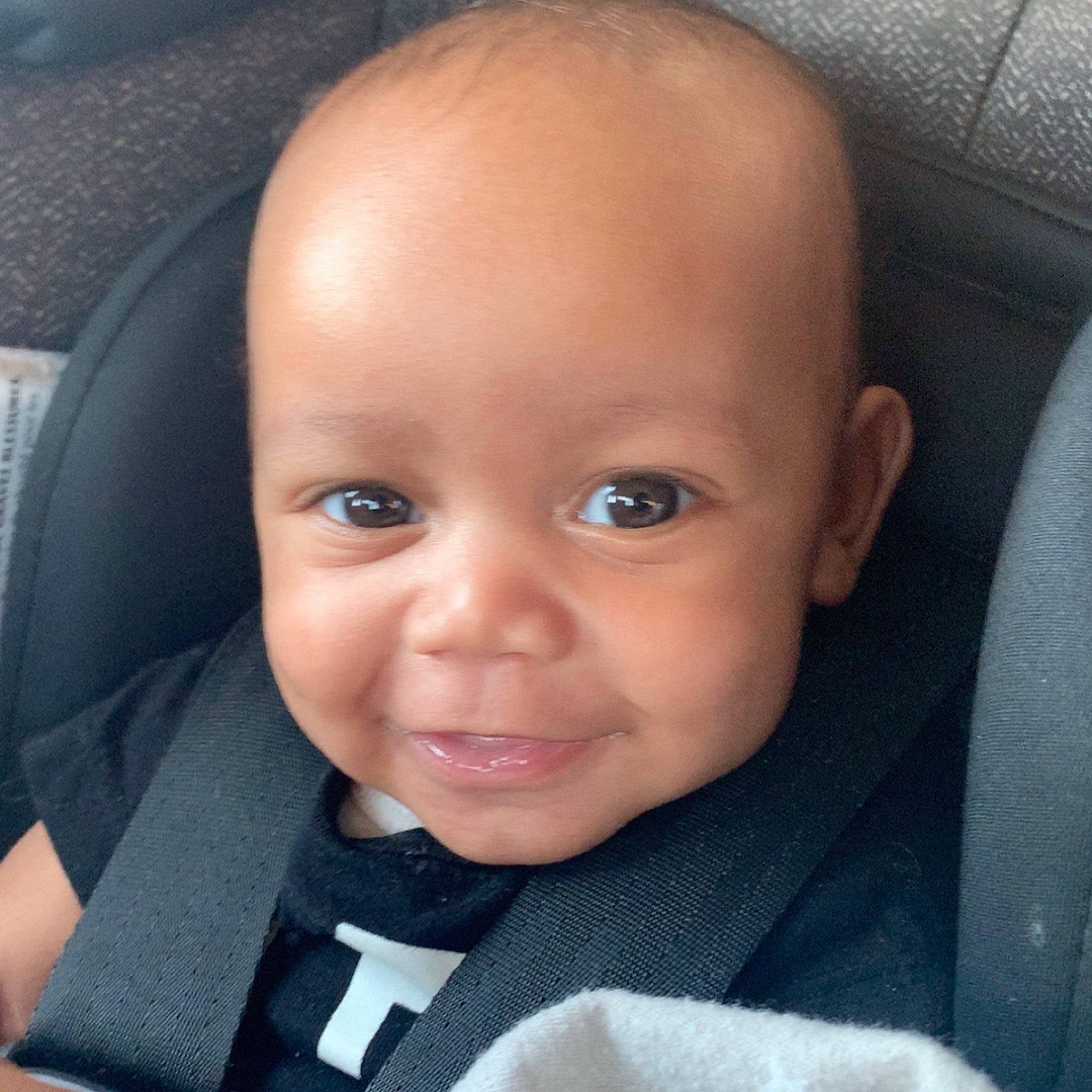 Keith joined the competition — help win amazing prizes! auto_part, baby, baby_toddler_clothing, car_seat, cheek, child, comfort, eyelash, family_car, formal_wear, happy, head_restraint, iris, lip, nose, person, selfie, sleeve, smile, toddler