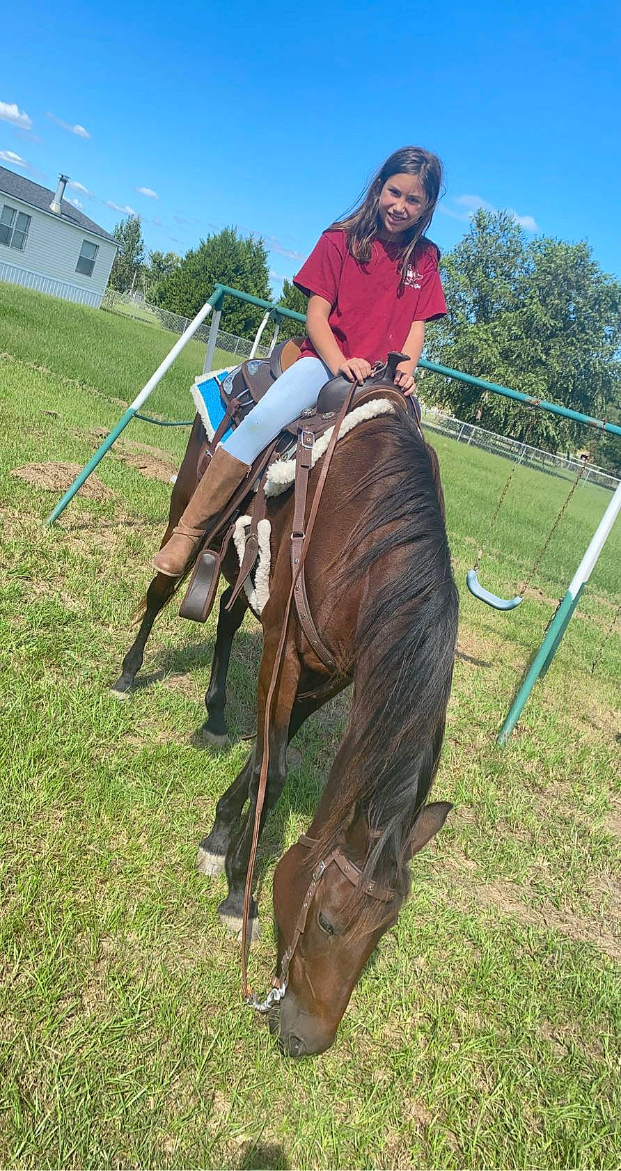 Rylee is registered to the contest to win money with this photo: animal_sports, bridle, equestrian_sport, equestrianism, halter, horse, horse_supplies, horse_tack, horse_trainer, jockey, joy, mane, mare, pack_animal, person, recreation, rein, saddle, stallion, western_riding