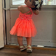 Zayjalee joined the competition — help win amazing prizes! toddler, child, dress, neon, orange, bows, hair, curly_hair, sandals, door, floor, wood_floor, indoor, playful, pose, looking_back, cute, girl, standing, window