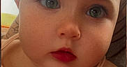 Blair joined the competition — help win amazing prizes! baby, child, face, green_eyes, pink_top, close_up, portrait, skin, young, infant, cute, expression, person, head, hair, eyebrows, lips, indoors, soft_light, curious