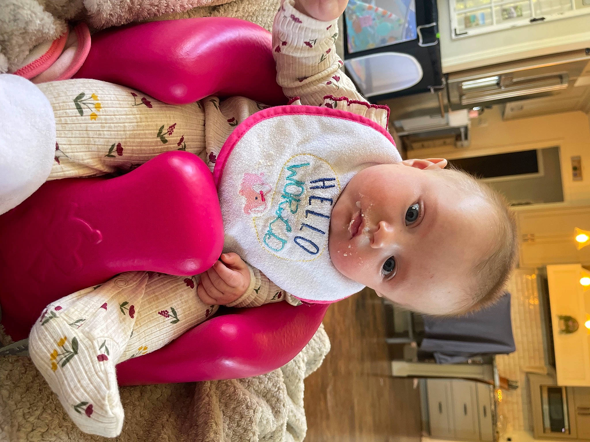 Keira is registered to the contest to win money with this photo: baby, baby_toddler_clothing, child, doll, fun, happy, hat, home_appliance, human_leg, nail, person, pink, retail, room, smile, toddler, toy, wood