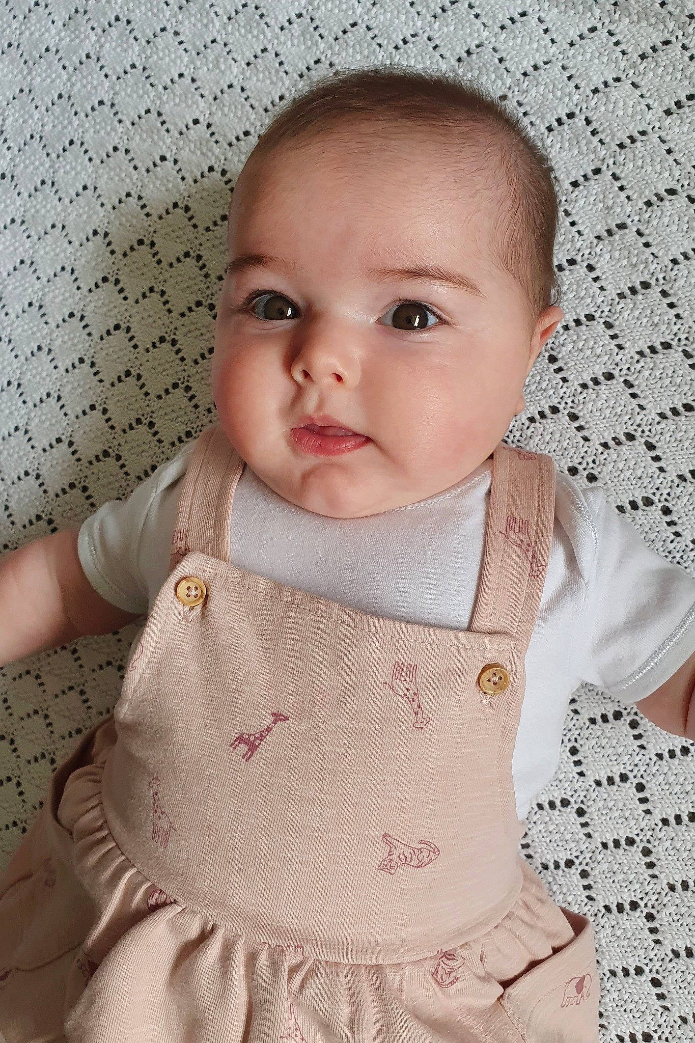 Alicia joined the competition — help win amazing prizes! arm, baby_toddler_clothing, cheek, chin, dress, face, facial_expression, hand, head, iris, lip, neck, nose, organ, outerwear, person, pink, skin, sleeve, standing