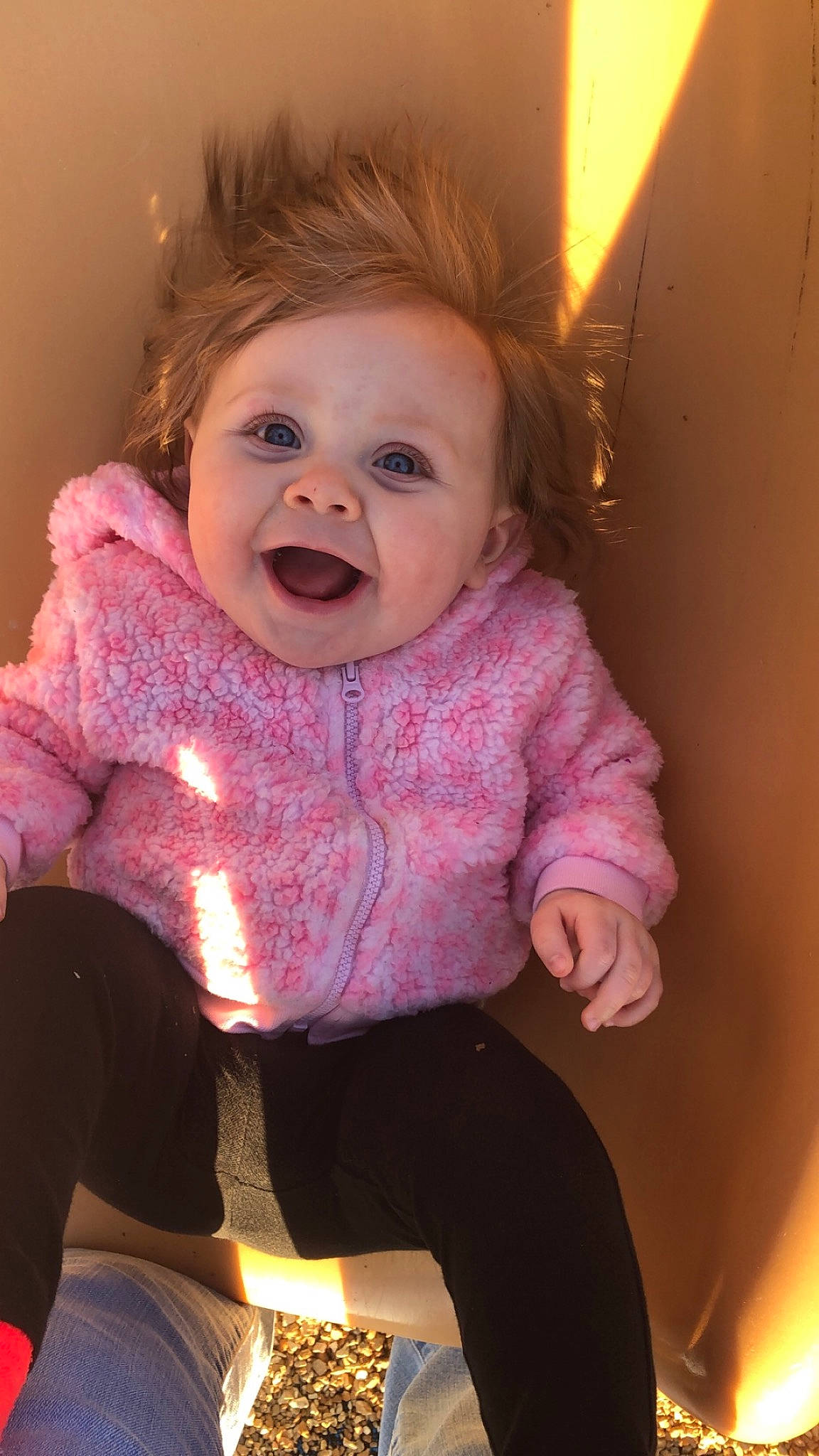 Hazley is registered to the contest to win money with this photo: baby, baby_toddler_clothing, cheek, chin, eye, eyebrow, finger, happy, human_body, iris, lip, mouth, neck, nose, outerwear, person, pink, skin, sleeve, smile