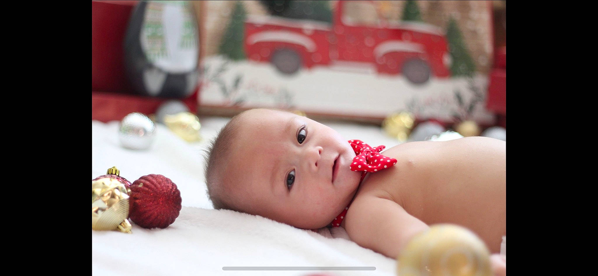 Colt joined the competition — help win amazing prizes! abdomen, automotive_exterior, automotive_lighting, baby, baby_products, cheek, chest, child, eye, happy, lip, motor_vehicle, mouth, person, red, sitting, skin, sweetness, toddler, toy