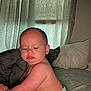 Maeve joined the competition — help win amazing prizes! baby, child, diaper, pout, sleepy, bed, pillow, blanket, indoors, curtain, soft_light, skin, face, chubby, person, infant, cute, expression, rest, toddler
