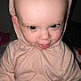 Maeve joined the competition — help win amazing prizes! baby, child, hoodie, pink_clothing, face, tongue_out, playful, mischievous, close_up, indoor, flash, person, cute, expression, hood, sitting, portrait, young_child, skin, headwear