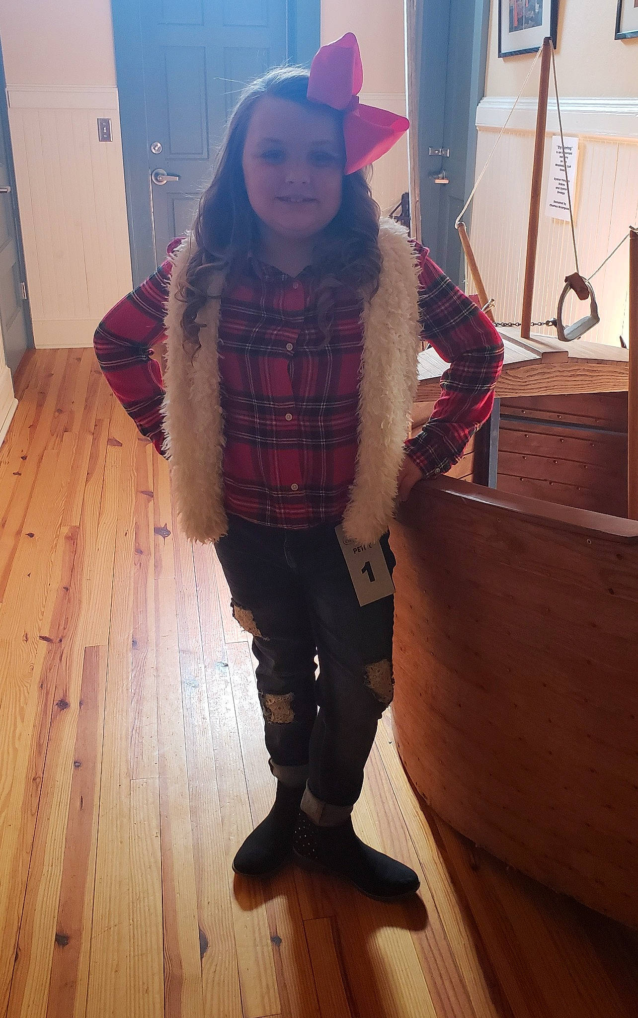 Kambreigh is registered to the contest to win money with this photo: floor, flooring, hardwood, jeans, joy, outerwear, person, standing, wood