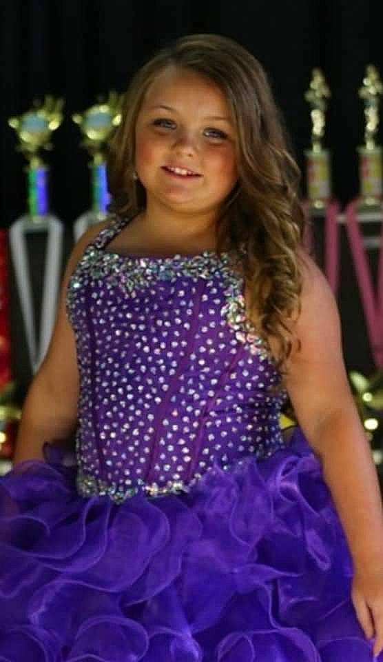 Kambreigh is registered to the contest to win money with this photo: child_model, clothing, cocktail_dress, dress, event, fashion, formal_wear, joy, lavender, person, purple, violet