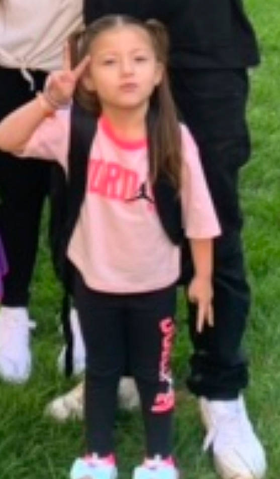 Ellyanna is registered to the contest to win money with this photo: active_pants, blurred, cool, fun, gesture, grass, hair, joint, knee, leg, leisure, long_hair, magenta, person, pink, sleeve, sportswear, street_fashion, thigh, thumb