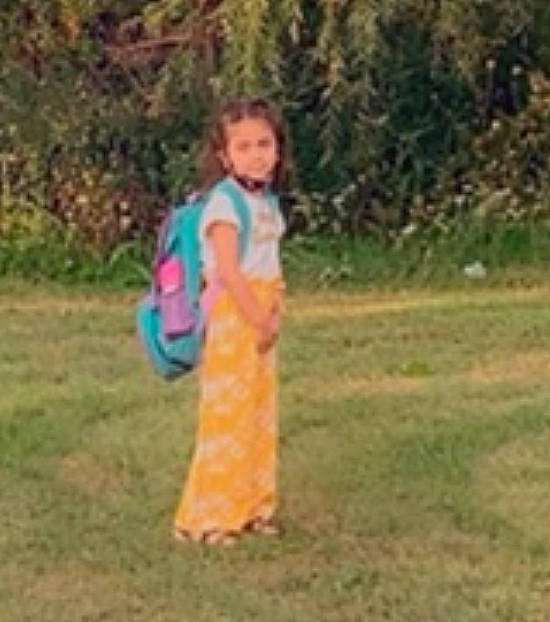 Millyanna is registered to the contest to win money with this photo: blurred, child, face, fun, grass, grassland, happy, landscape, leisure, pasture, people_in_nature, person, plant, prairie, recreation, sleeve, soil, toddler, travel, tree