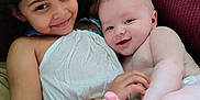 James joined the competition — help win amazing prizes! child, baby, smiling, cuddling, sibling, indoor, cozy, chair, dress, happy, face, skin, foot, hand, portrait, family, toddler, infant, relaxing, love