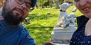 Jesslynn is registered to the contest to win money with this photo: blue_sky, casual_clothing, cemetery, child, dog_statue, family, glasses, grass, headshot, man, nature, outdoor, portrait, selfie, smile, statue, sunny, tattoos, tree, woman