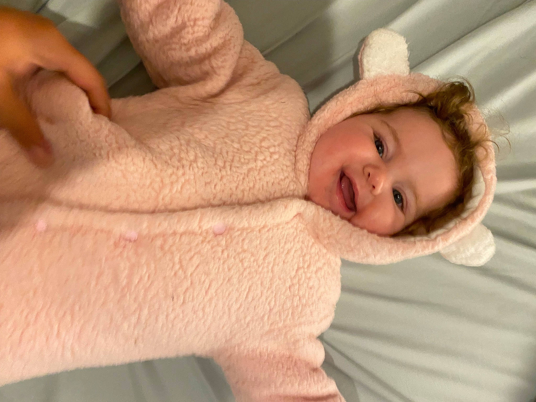 Aloura is registered to the contest to win money with this photo: cheek, comfort, elbow, eyelash, finger, fur, gesture, happy, joy, leg, linens, lip, nose, person, shoulder, skin, sleeve, smile, textile, thumb