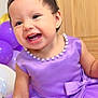 Aysha is registered to the contest to win money with this photo: toddler, child, smiling, purple_dress, tiara, pearl_necklace, earring, balloons, happy, indoor, celebration, portrait, cute, person, festive, party, dress, baby, joyful, accessory