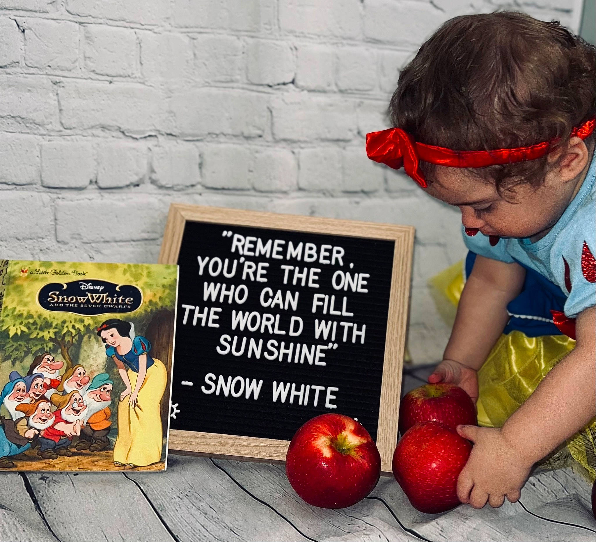 Fallon is registered to the contest to win money with this photo: advertising, apple, blackboard, eyewear, font, food_group, fruit, glasses, grass, local_food, mcintosh, natural_foods, person, plant, produce, recipe, strawberry, sunglasses, superfood, vegetable