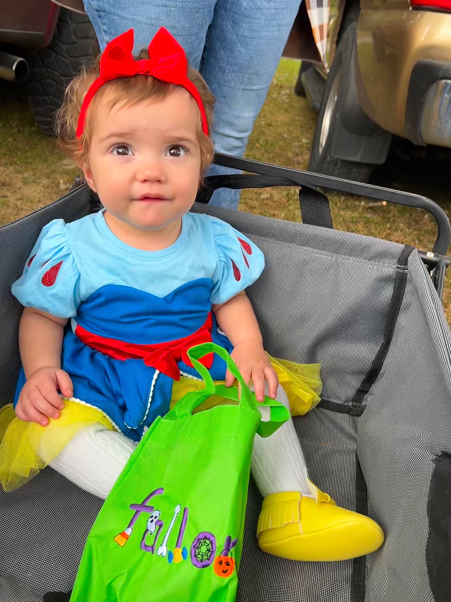 Fallon joined the competition — help win amazing prizes! baby, baby_products, baby_toddler_clothing, bag, child, electric_blue, family_car, fun, grass, hairstyle, happy, leisure, luggage_and_bags, motor_vehicle, person, sitting, skin, tire, toddler, vehicle_registration_plate