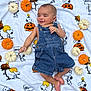 autumn, baby, blanket, child, cozy, cute, decor, denim_overalls, fall, festive, holiday, infant, lying_down, orange, portrait, pumpkins, smiling, snoopy, soft_texture, white