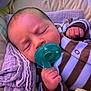 Benny Love joined the competition — help win amazing prizes! newborn, baby, sleeping, pacifier, blanket, onesie, striped_clothing, hand, face, infant, soft_lighting, resting, cute, cozy, portrait, indoor, child, peaceful, closeup, sleep