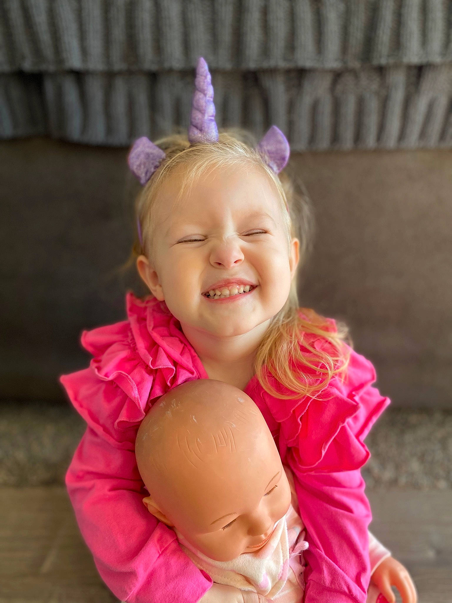 Ava joined the competition — help win amazing prizes! beauty, blond, child, ear, event, facial_expression, fun, happy, head, headgear, headpiece, joy, magenta, mammal, party_supply, person, pink, skin, smile, toddler