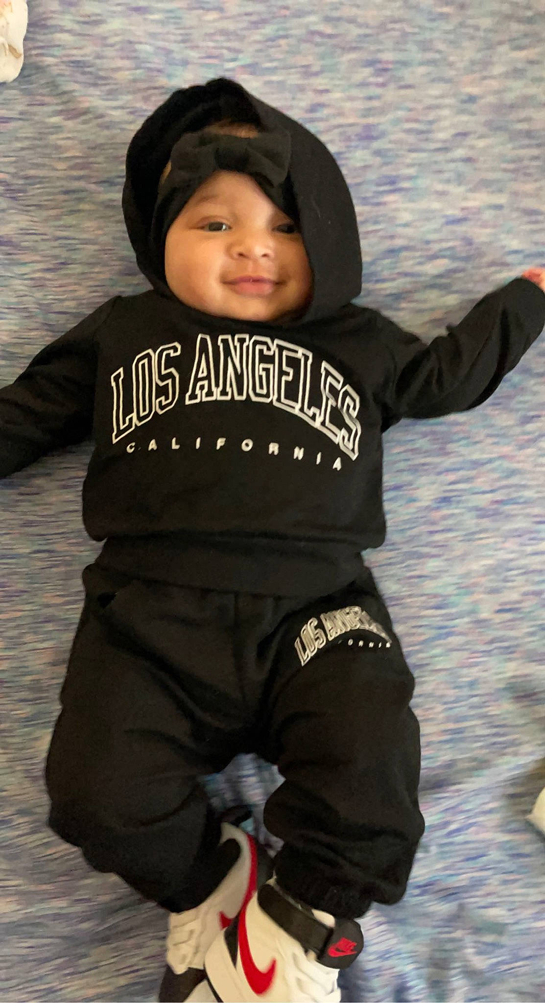 Lillyann joined the competition — help win amazing prizes! baby, baby_toddler_clothing, cap, child, electric_blue, fashion_accessory, fun, happy, headgear, headwear, helmet, hood, jacket, person, personal_protective_equipment, photograph, sitting, sleeve, smile, sportswear