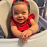 Amari joined the competition — help win amazing prizes! baby, bracelet, child, clapping, curtains, cute, face, furniture, hair, happy, high_chair, indoor, infant, person, portrait, red_bows, red_dress, seated, smiling, young_child