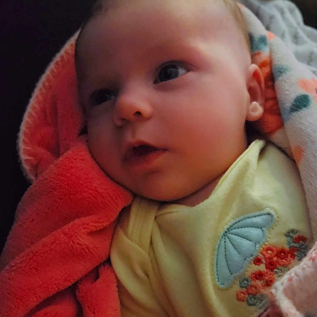 Sydney joined the competition — help win amazing prizes! baby, bed, blanket, clothing, couch, cushion, face, furniture, happy, head, homedecor, linen, newborn, person, photography, portrait, quilt, sleeping, smile, towel