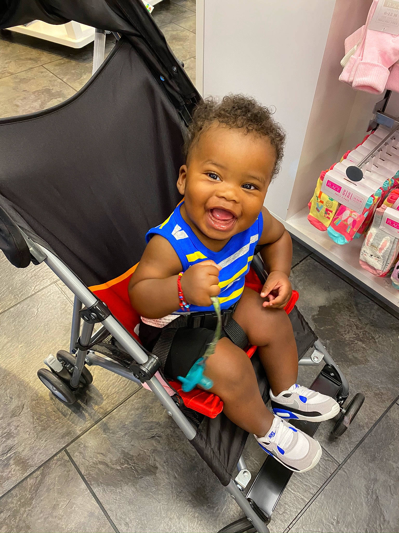 Kobi is registered to the contest to win money with this photo: baby, baby_carriage, baby_products, child, leg, person, play, product, smile, toddler, vacation, vehicle