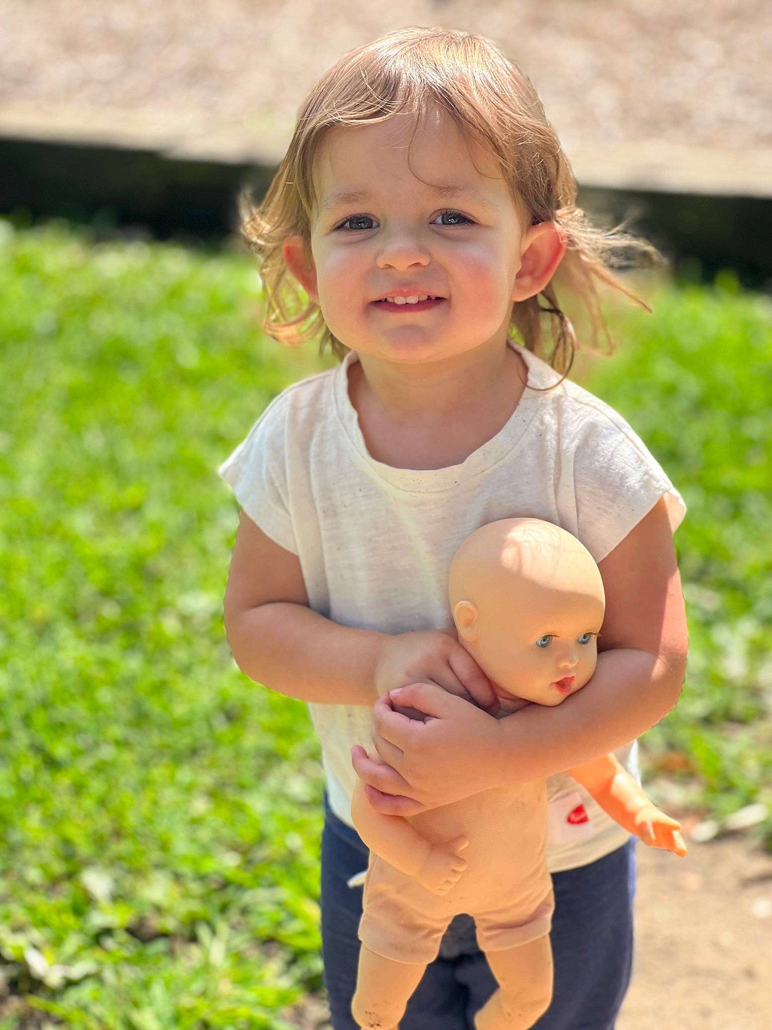 Emmy joined the competition — help win amazing prizes! baby, baby_toddler_clothing, child, fun, gesture, grass, happy, joy, leisure, people_in_nature, person, plant, play, portrait_photography, recreation, sitting, smile, soil, t_shirt, toddler