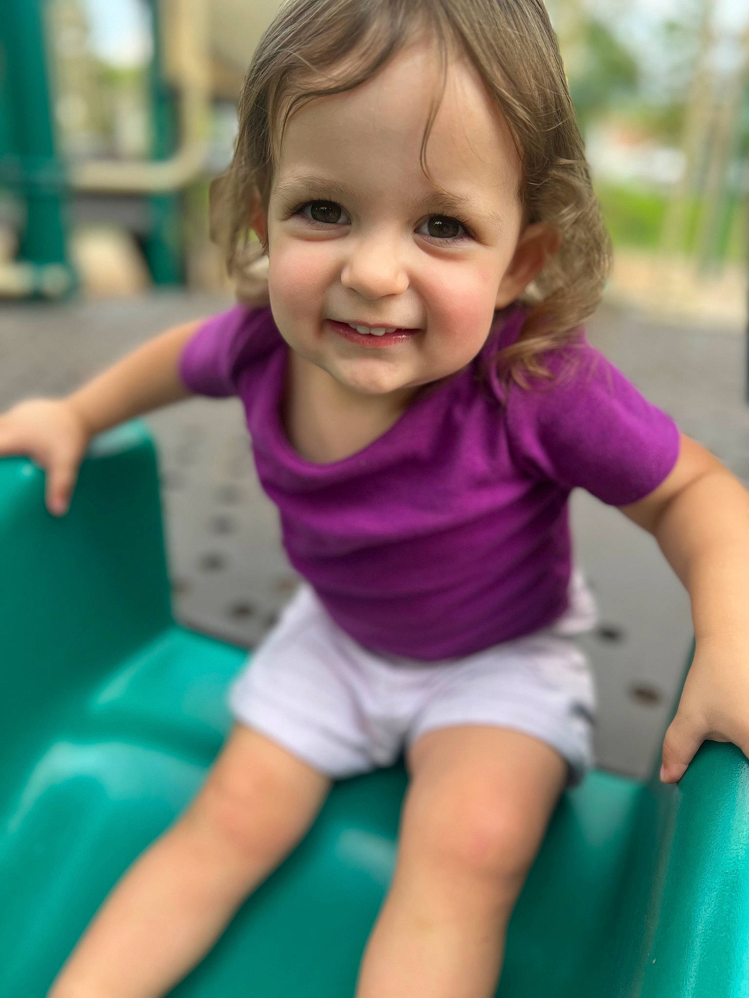 Emmy is registered to the contest to win money with this photo: baby_toddler_clothing, child, eye, fun, grass, happy, joy, leisure, magenta, people, people_in_nature, person, photograph, pink, recreation, shorts, skin, smile, summer, t_shirt