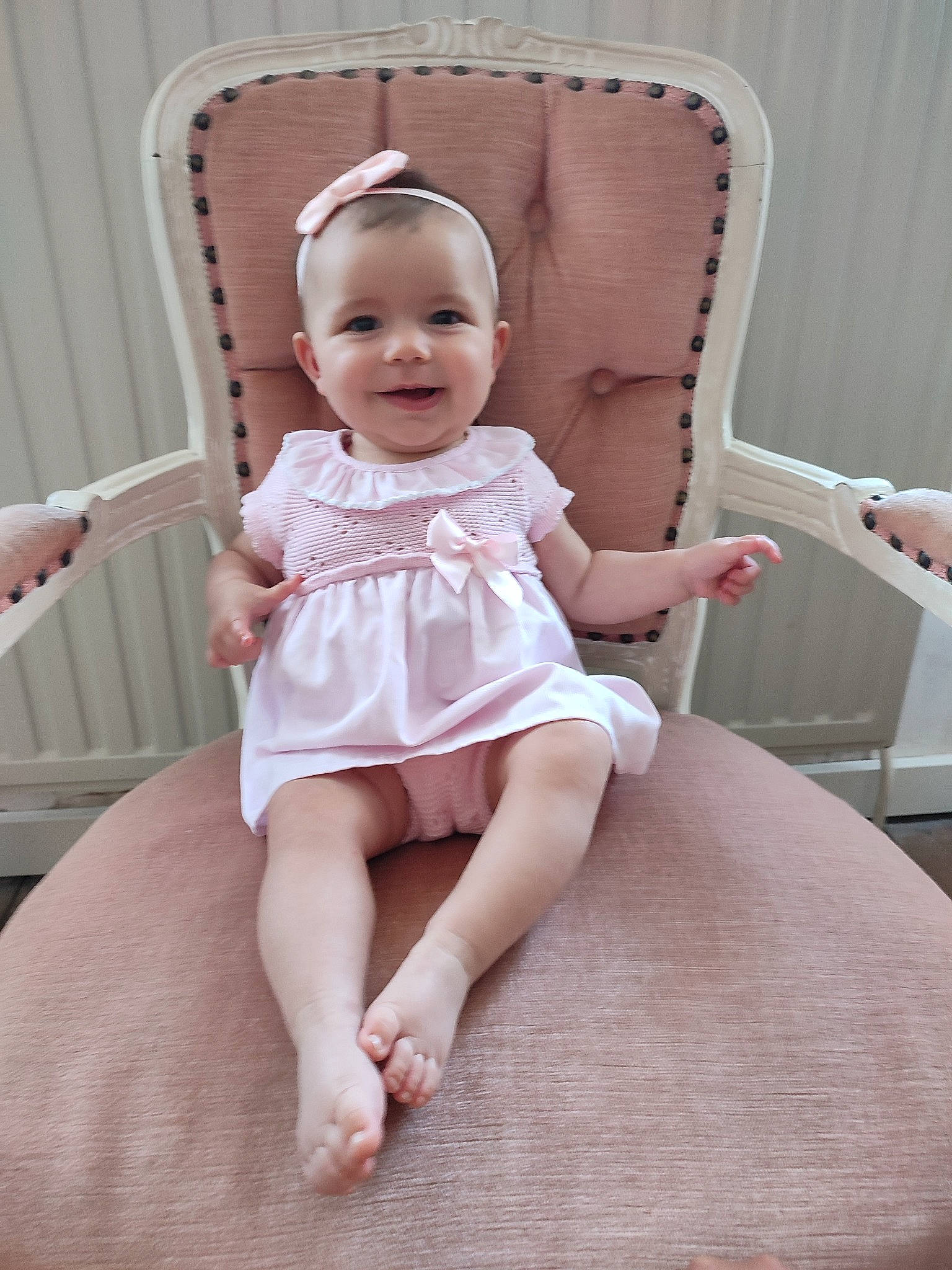 Lina-rose participe au concours pour gagner de l'argent avec cette photo : arm, baby_toddler_clothing, chair, comfort, day_dress, dress, embellishment, face, finger, flash_photography, happy, head, iris, joy, one_piece_garment, person, pink, skin, sleeve, smile