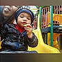Nathaniel Truncer joined the competition — help win amazing prizes! toddler, child, adult, playground, slide, hat, jacket, snack, outdoor, play, yellow_slide, trees, winter_clothing, person, fun, park, expression, face, hand, leisure