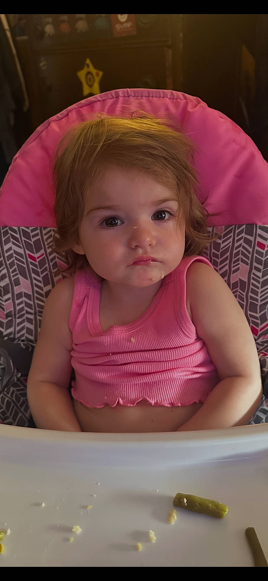 Ella joined the competition — help win amazing prizes! baby, child, crumbs, curious, expression, face, feeding, food, hair, high_chair, indoor, meal, messy, pink_shirt, portrait, seat, skin, table, toddler, young