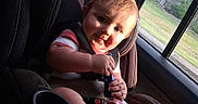 Dustin joined the competition — help win amazing prizes! baby, child, car_seat, toy, vehicle, window, sunlight, seatbelt, infant, sitting, interior, cute, portrait, car, young_child, seat, safety, daylight, face, expression