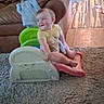 Dustin joined the competition — help win amazing prizes! baby, blanket, carpet, casual, child, clothing, couch, floor, furniture, happy, home, indoor, person, plastic_slide, playtime, sitting, smiling, toddler, toy, wooden_floor