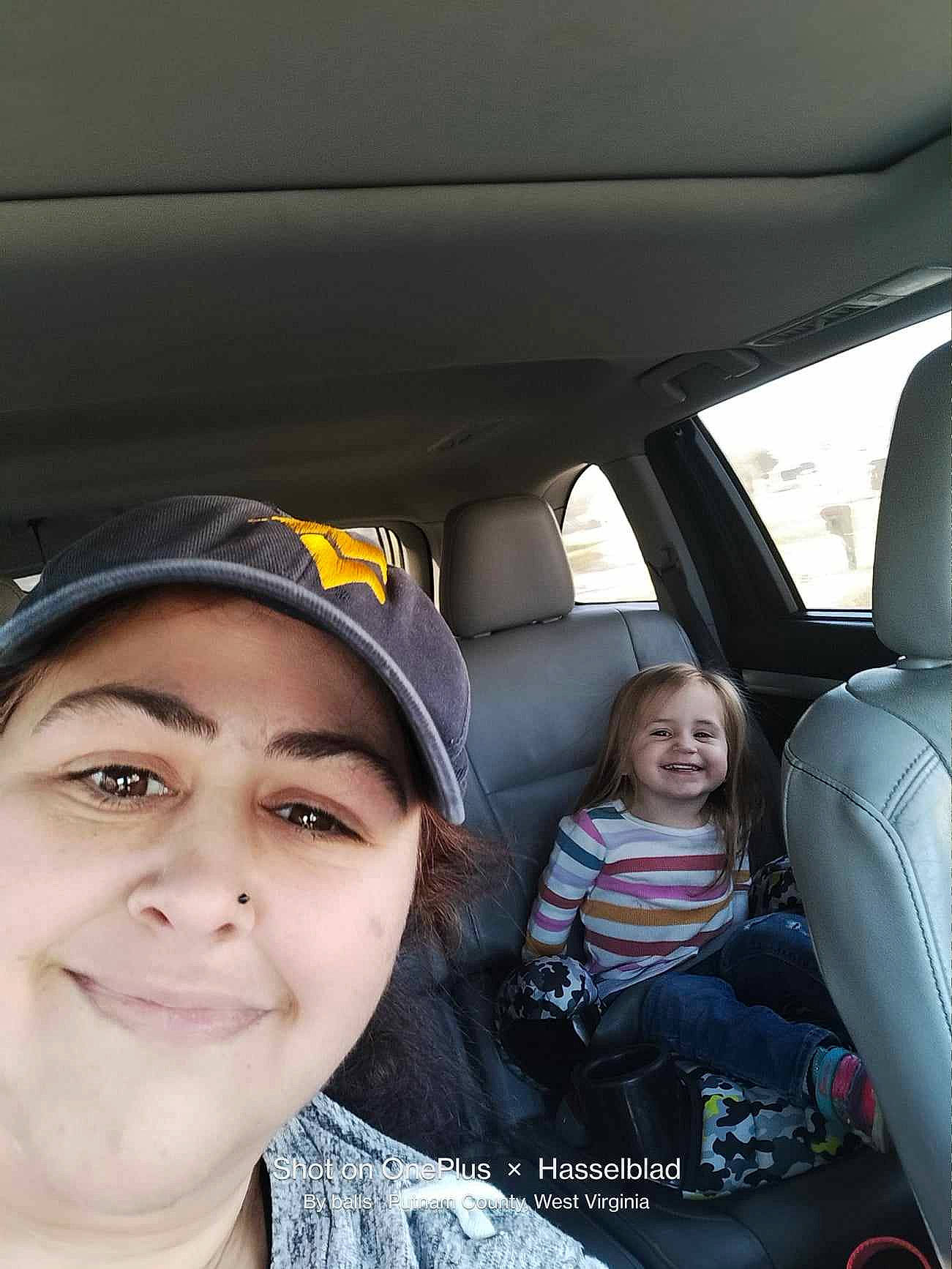 Kyra joined the competition — help win amazing prizes! auto_part, automotive_design, automotive_exterior, car, car_seat, car_seat_cover, child, comfort, eyelash, family_car, fun, happy, head_restraint, headwear, joy, motor_vehicle, person, plant, smile, steering_wheel