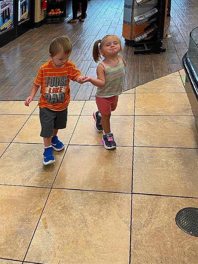 Kyra joined the competition — help win amazing prizes! child, floor, flooring, foot, fun, hardwood, human_leg, joint, leg, leisure, luggage_and_bags, person, recreation, shoe, shorts, sidewalk, sneakers, t_shirt, thigh, toddler