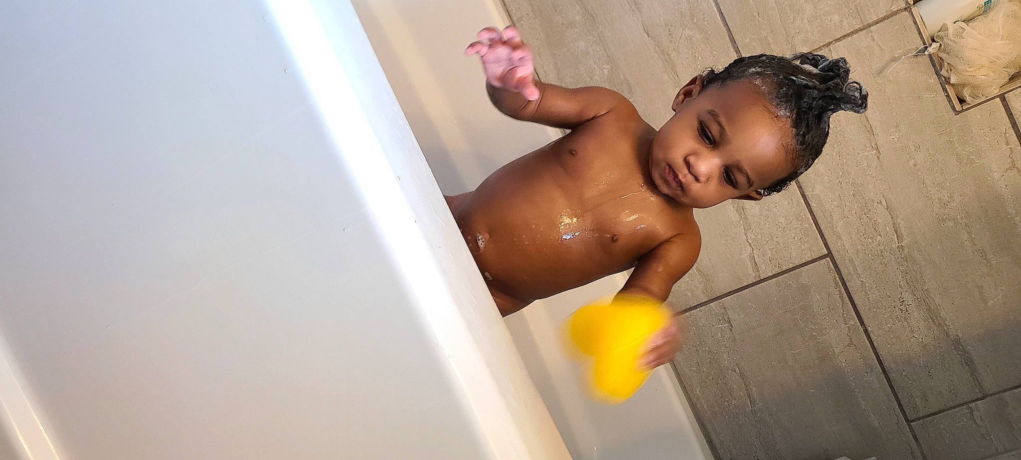 Kaysen joined the competition — help win amazing prizes! arm, baby, bathing, bathroom, bathtub, chest, child, elbow, finger, flash_photography, fun, happy, human_body, human_leg, leg, person, plumbing_fixture, shoulder, smile, toddler
