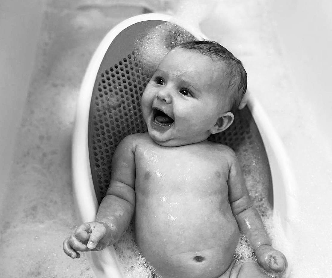 Lillie-rose is registered to the contest to win money with this photo: baby, baby_bathing, bathing, bathtub, black, black_and_white, child, facial_expression, fun, monochrome, monochrome_photography, person, photograph, photography, skin, smile, style, toddler